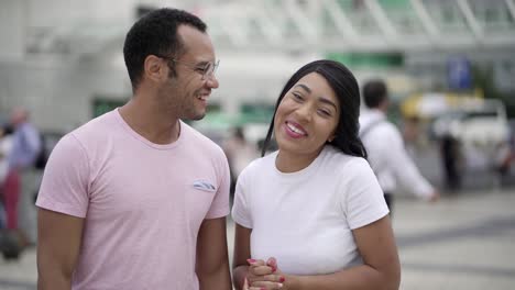 happy young people talking to camera