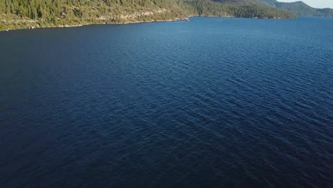 Tilt-Up-Aerial-on-Lake-Tahoe,-Sierra-Nevada,-USA