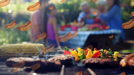 animation of failing hot dogs over caucasian family outside and grill