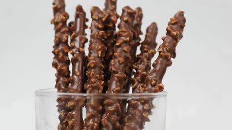 Almond-nut-dark-chocolate-stick-on-table