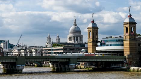 the busy london bridge in the united kingdom on a sunny day -time lapse