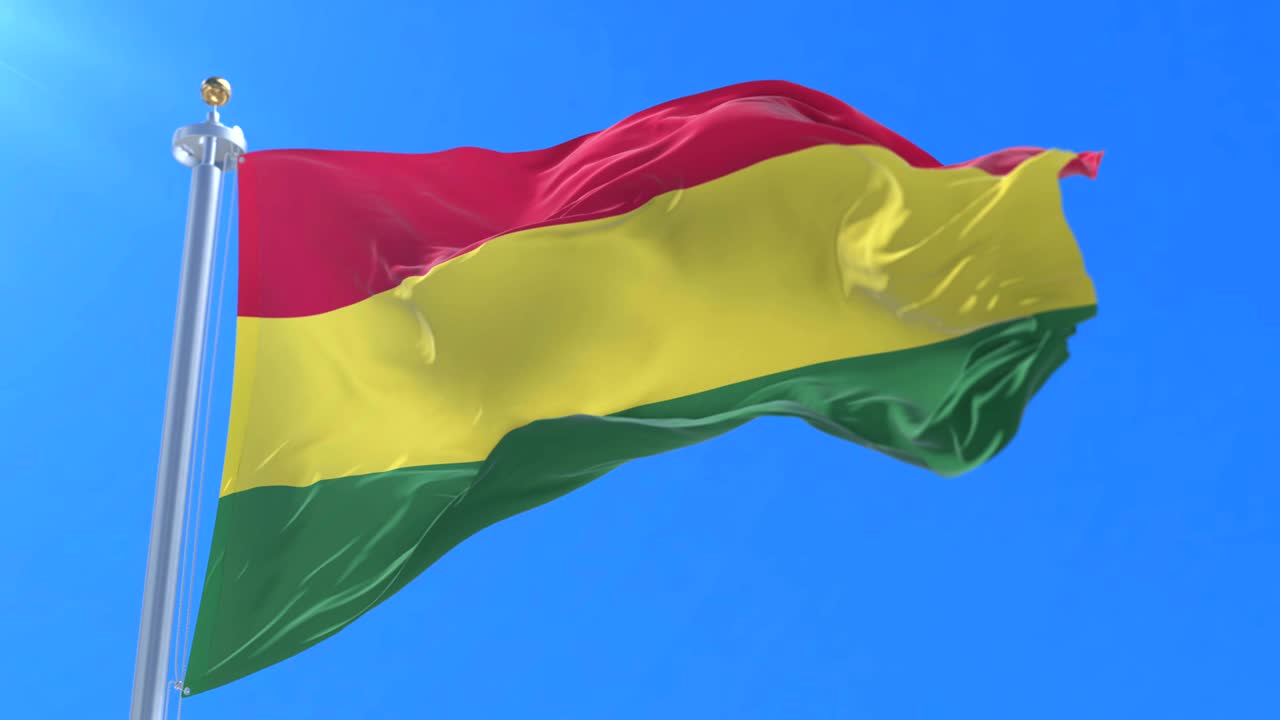bandera boliviana agitando el viento en lento con el cielo azul, bucle