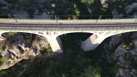 drone view of the large historical bridge built in the canyon