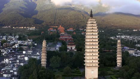 Beautiful-Three-Pagodas-Buddhist-temple-in-Dali,-Mt-Cangshan-China,-aerial