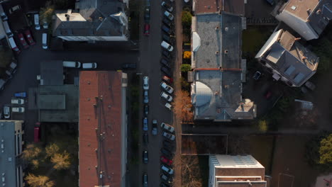 Aerial-birds-eye-overhead-top-down-view-of-cars-parked-in-streets-of-Bornheim-neighbourhood.-Vertical-panning-of-empty-streets-in-quarantine-period-due-to-COVID-19.-Frankfurt-am-Main,-Germany