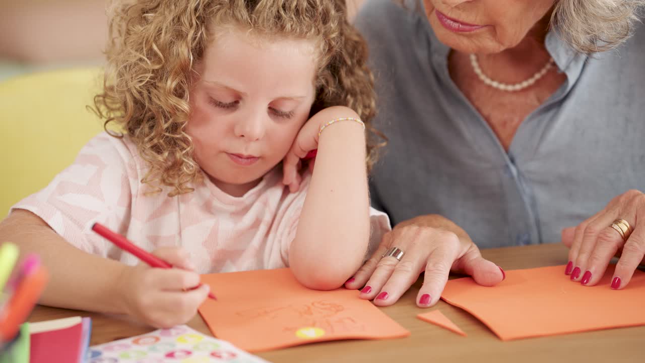 Grandmother and Child Drawing Together