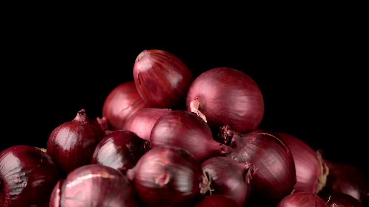 fondo de cebollas rojas giratorias