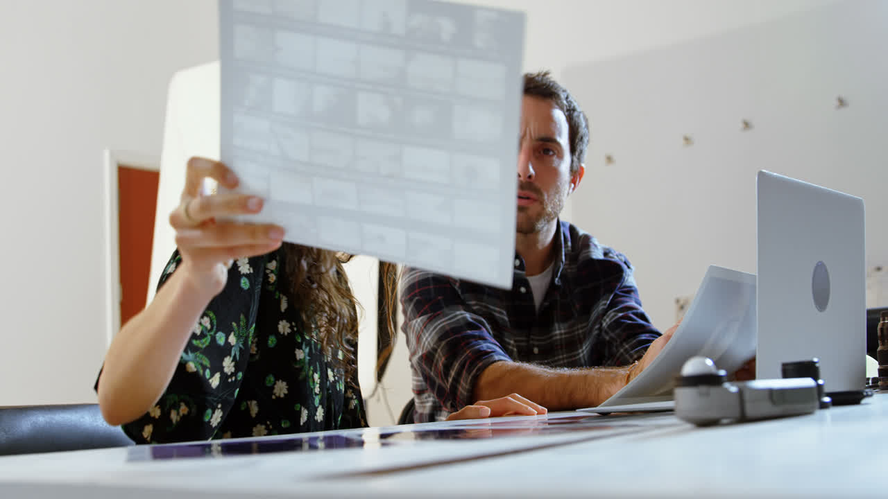 Photographer discussing over photos 4k