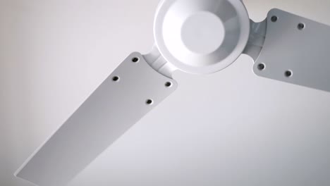 white metal fan spinning