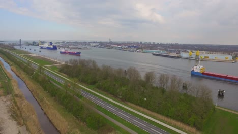 Cargo-ships-at-the-port-of-Terneuzen,-Netherlands,-going-to-Ghent-in-Belgium