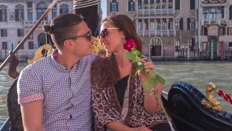 couple enjoying a romantic gondola ride in venice