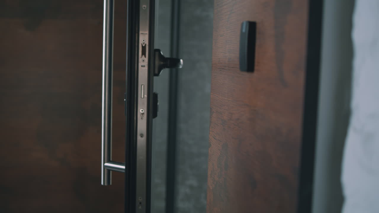 Man Entering Modern Home with Security System