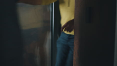 man entering modern home with security system