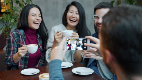 friends taking a picture in a cafe