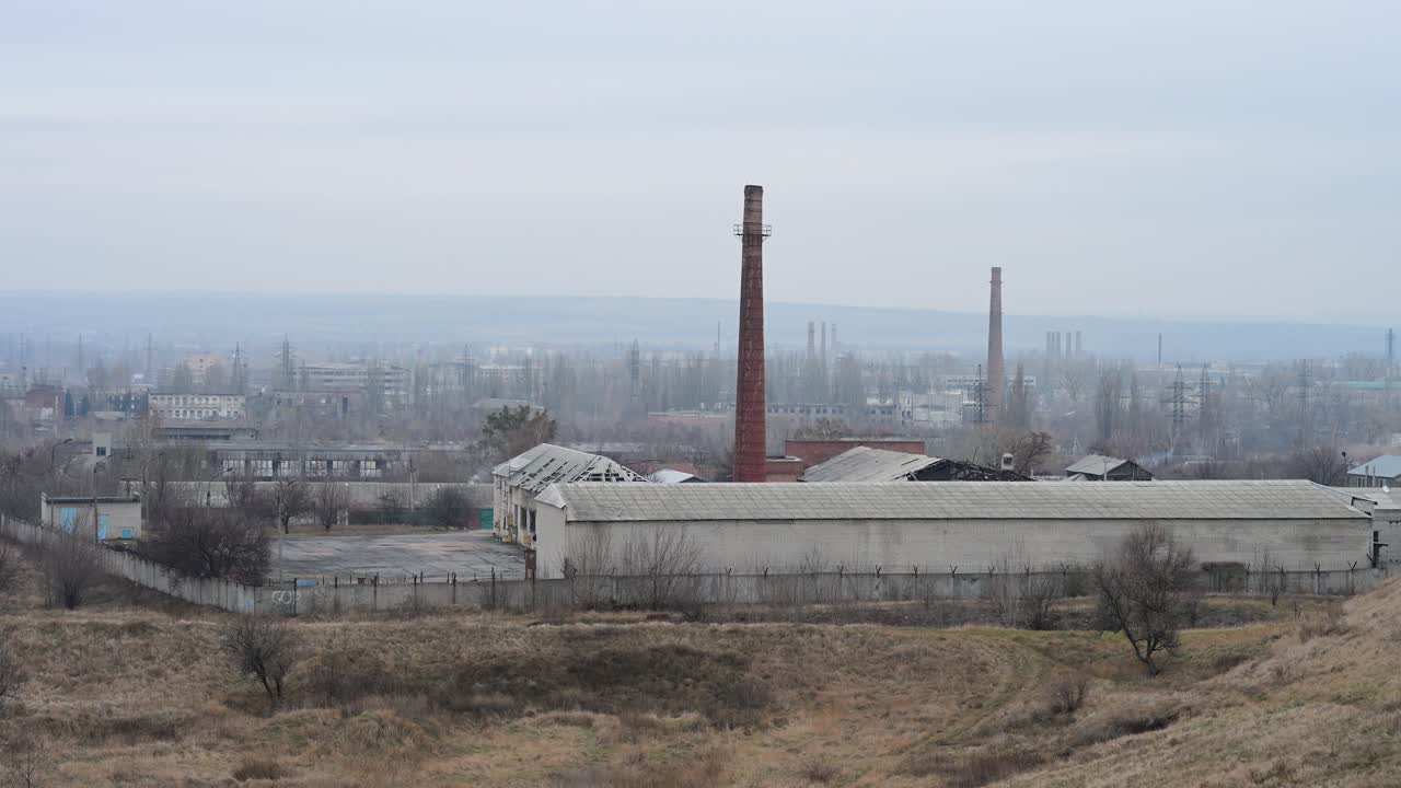 The industrial outskirts of Kramatorsk, Ukraine. Smokestacks and factory buildings dominate the landscape of this key city in the Donbas region, a focal point of the war