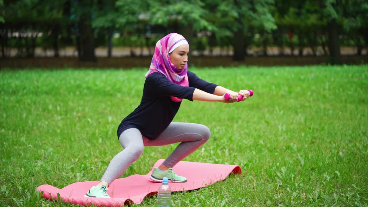 Muslim woman exercising outdoors