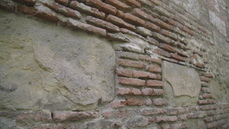 a 12th-century old church wall built by bricks