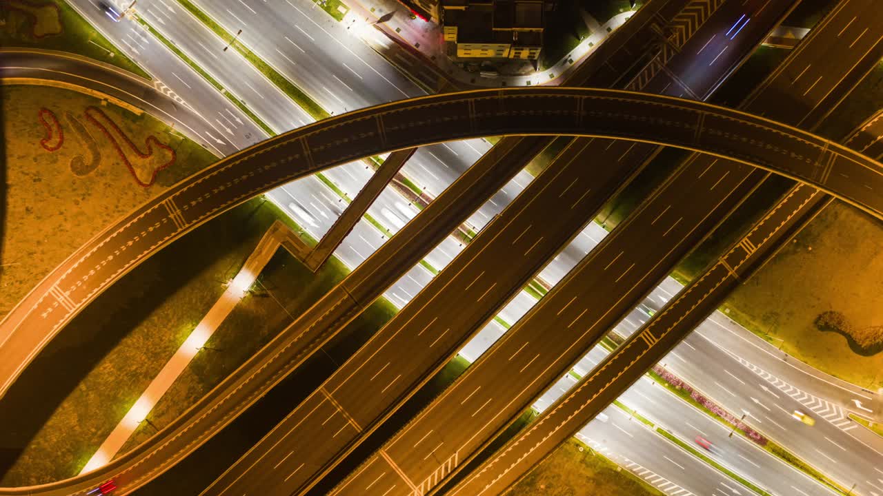 noche iluminado zhuhai tráfico carretera cruce bahía de macau aérea de arriba hacia abajo panorama 4k timelapse china