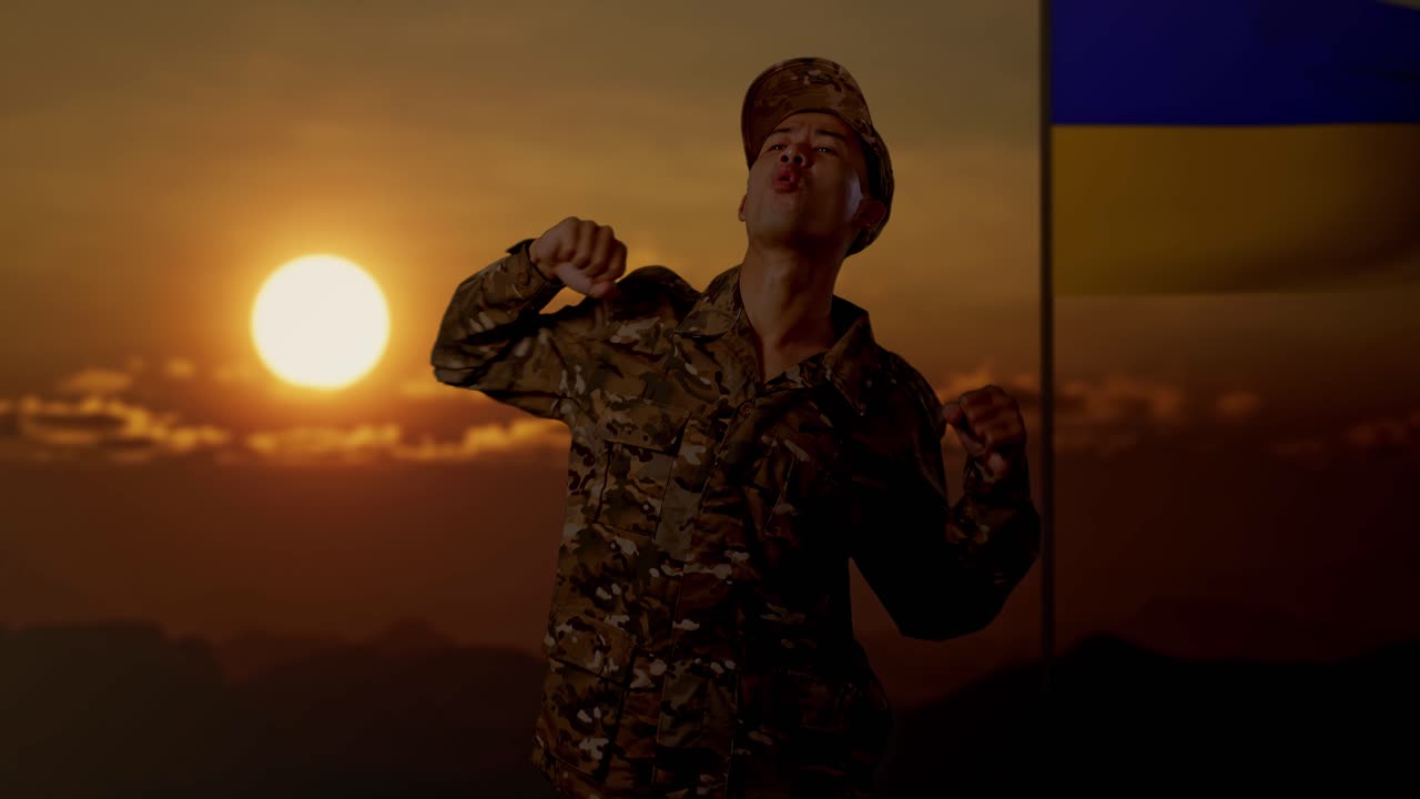 Ukrainian Soldier Celebrating Sunset Victory