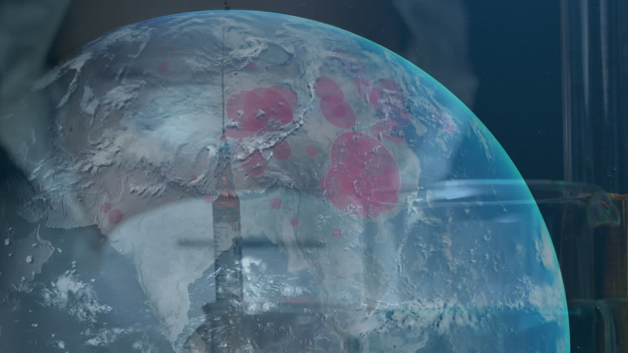 가득 찬 주사기로 회전하는 지구의 애니메이션