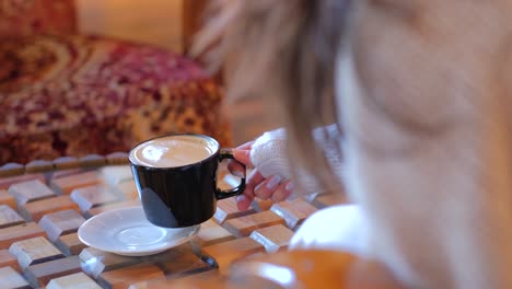 cozy fireplace ambiance with a cup of coffee