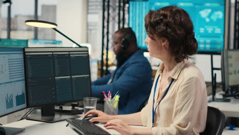 vertical video female advisor in workstation thinking about a new strategy to increase profit