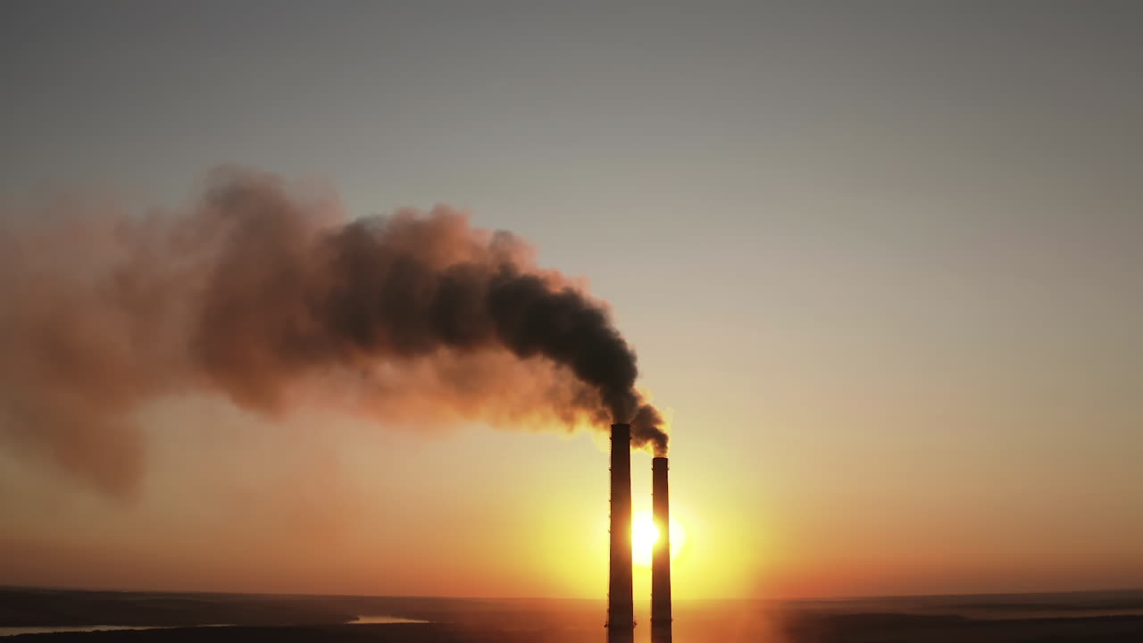 Power pylons on sunset time background. High voltage electric tower at the sunset. Fabric concept. Selective focus