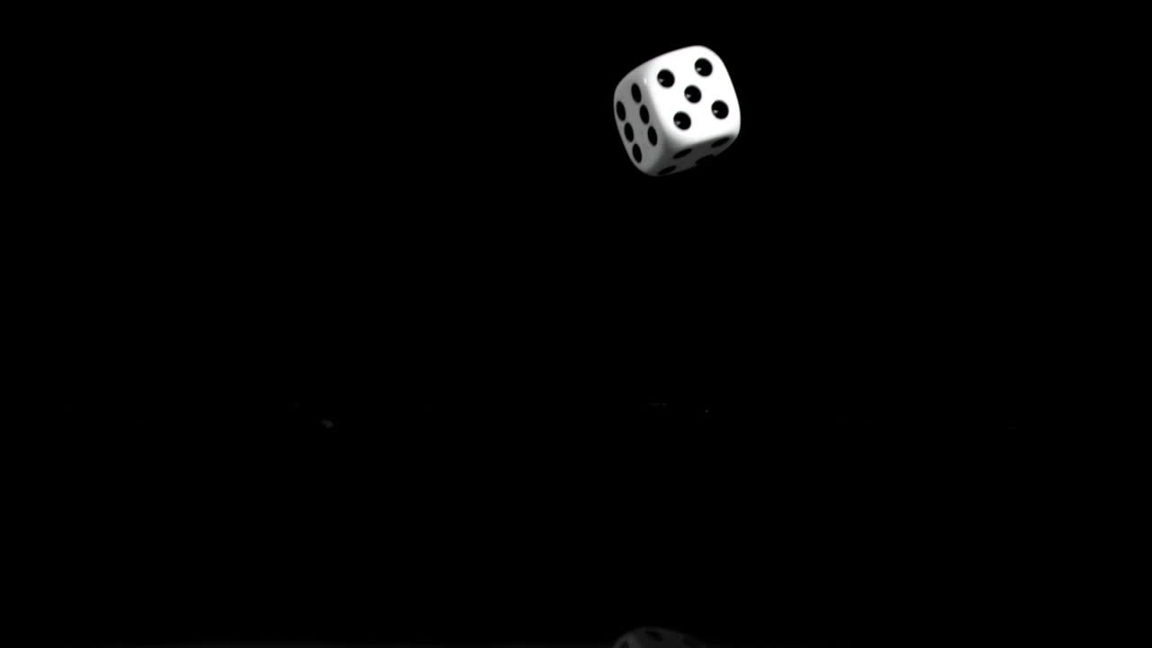 One white dice in a super slow motion rebounding 