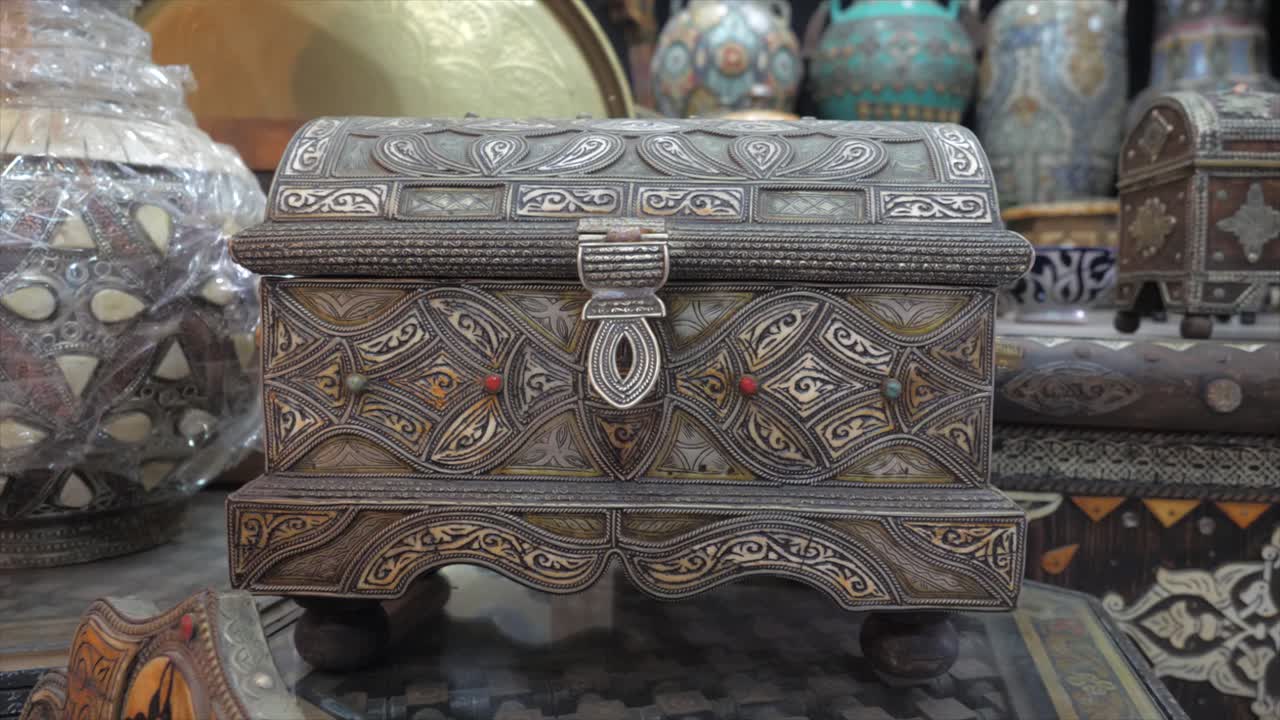 Ancient bronze treasure chest kept in an antique shop
