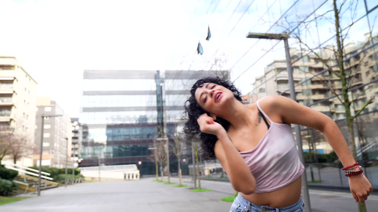 Woman dancing in an urban environment
