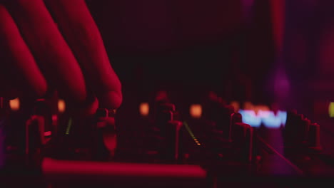 dj mixing at a nightclub