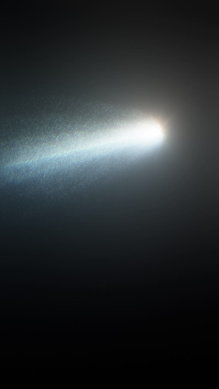 Cometa diretta verso il vuoto dello spazio. Particelle di detriti di ghiaccio in scioglimento. Oggetto extraterrestre astratto e luminoso. Rendering di animazione 3D di 3i Atlas. Formato verticale 9:16.