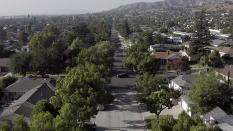 burbank california ordinary residential suburban houses aerial view moving along neighbourhood roads - gardens