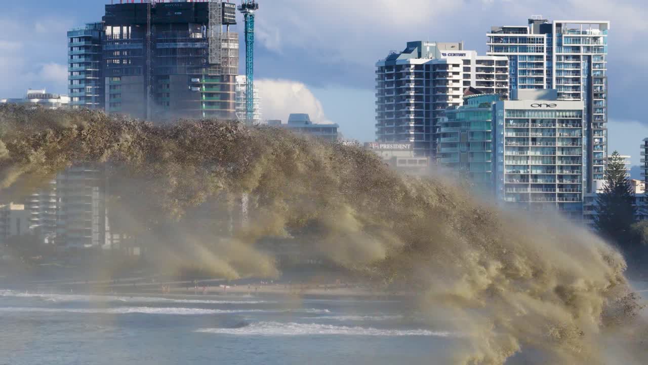 Sand is pumped into the ocean near a city skyline, highlighting urban dredging activities with dynamic water and sand movement