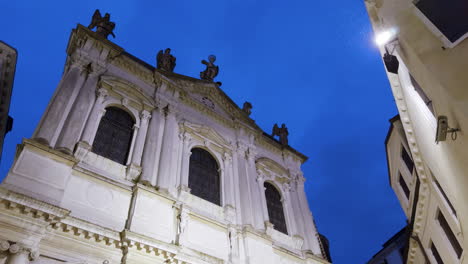 facade of a church in venice at night