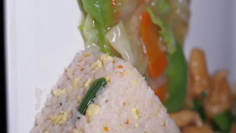 close-up of classic fried rice with egg and vegetables