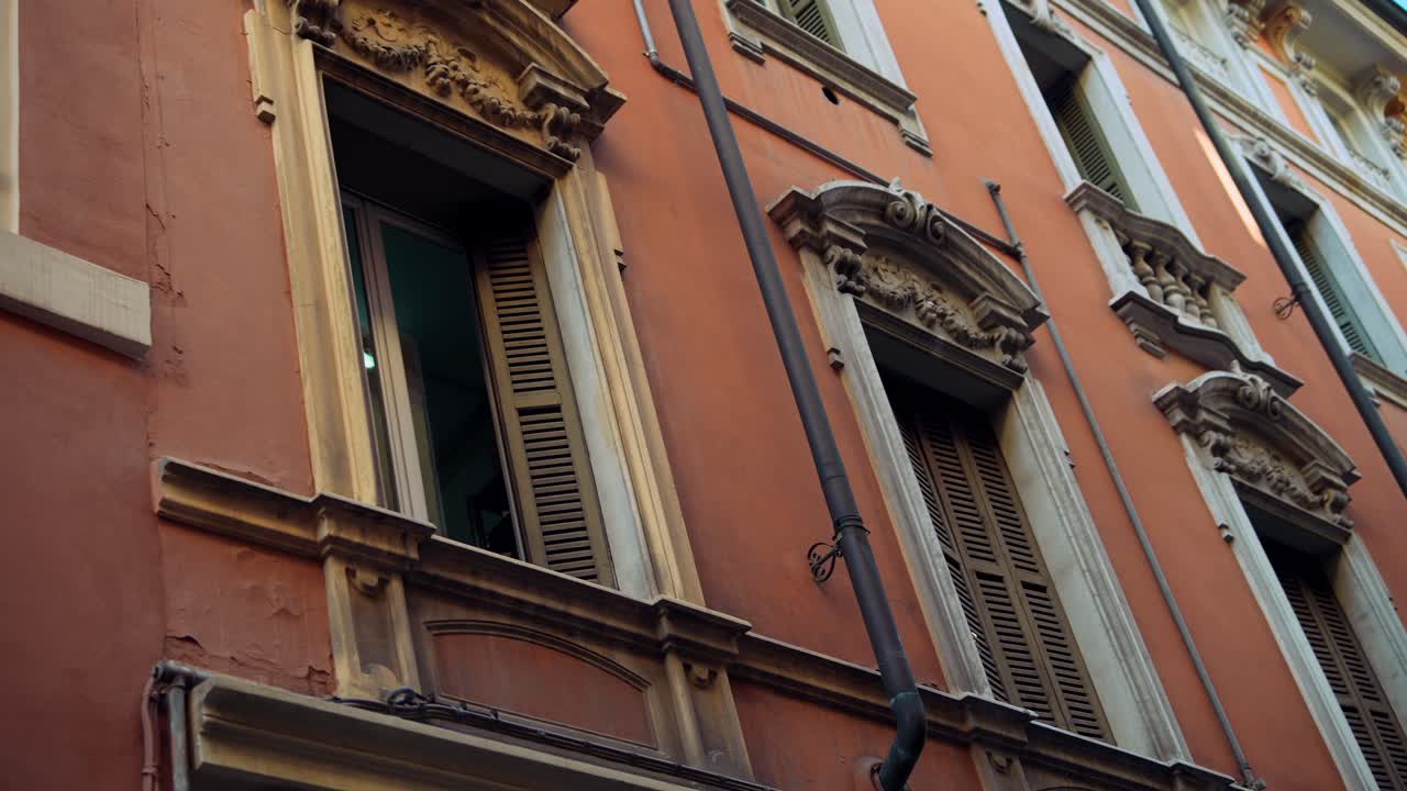 Facade of an Old Building with Decorative Windows