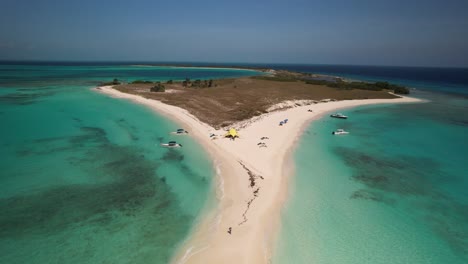 Stunning-aerial-view-of-Cayo-de-Agua-with-crystal-clear-turquoise-waters-and-sandy-beaches