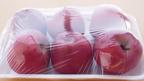 close-up of a package of red apples