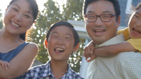 slow motion shot of happy family group outdoors