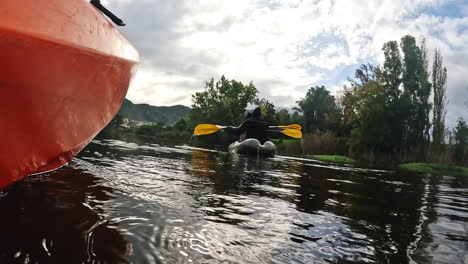 Kayaking,-water-sport-and-friends-on-a-boat