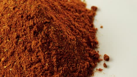 chili powder in white background 4k