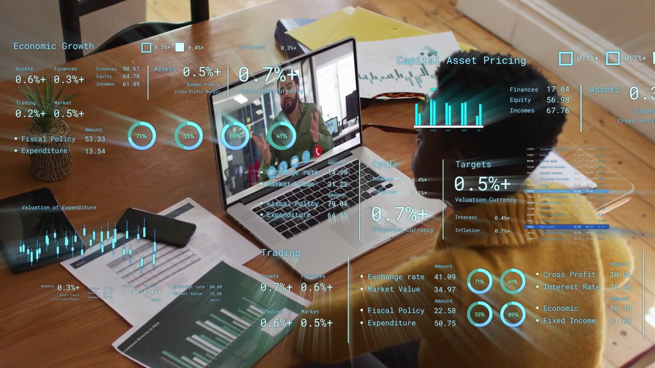 Woman starting remote call at table using laptop and finance charts while animated data updating