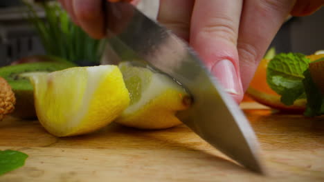 cutting lemon and other fruits