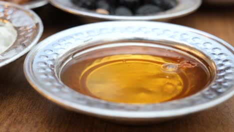 close up of a bowl of honey