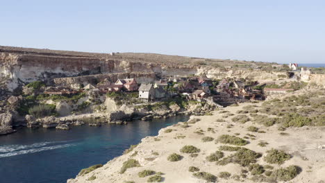 popeye village theme fun park in sunny prajjet bay,malta,aerial zoom