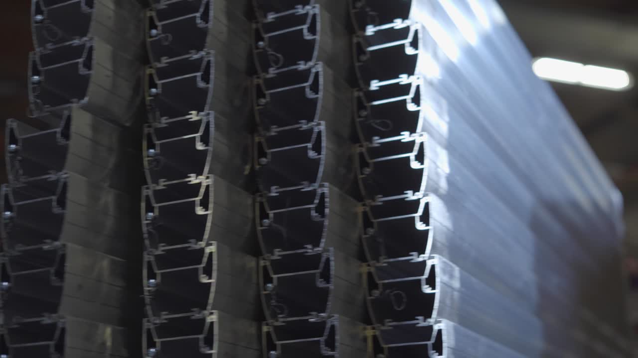 Beautiful Metal Construction in Rows with Reflections and Sun Flares Inside Seamless. Reflective Steel Tubes