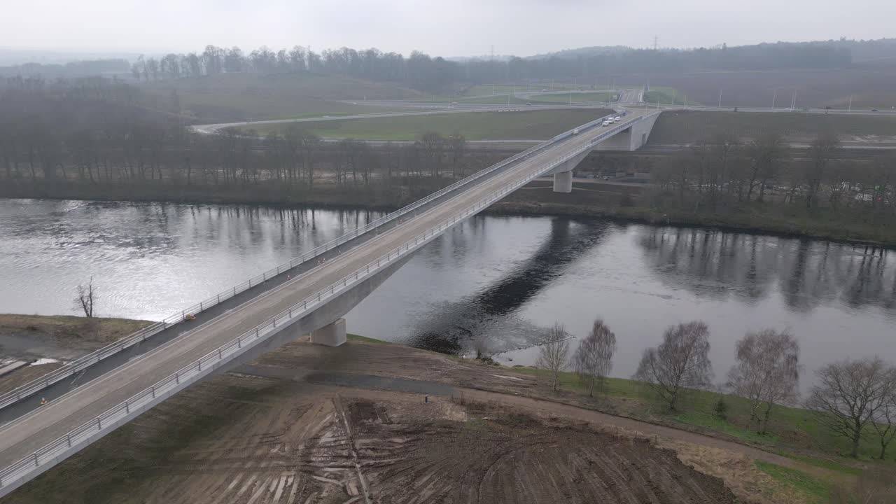 Aerial footage showcasing the construction site around the new Destiny Bridge across River Tay, Perth.