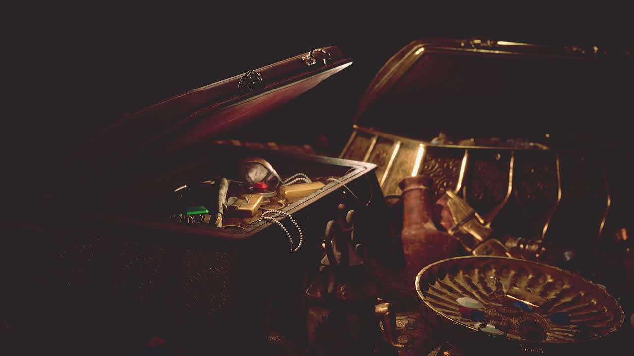 어 ⁇  속에서 보석과 금 동전을