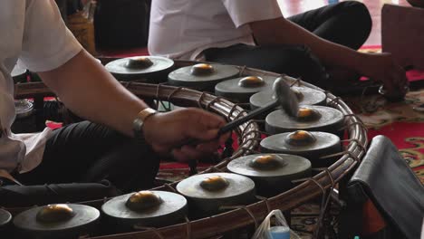 medium shot of traditional cambodian instrument